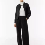 Bomber jacket with gathered details on the sleeves